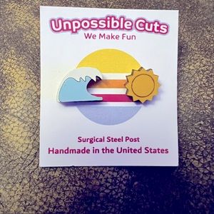 Unpossible Cuts beach wave and sun pierced earring studs.